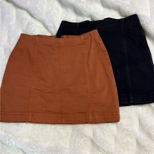 SET OF TWO form fitting stretchy jean skirts